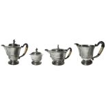 The silver set. Comprising teapot, coffee pot, milk jug and sugar bowl. 738 gr.