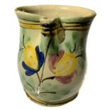 Jug, majolica of Caltagirone first 900. Decorated with flowers. H 21 cm.