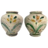 Pair of earthenware bowls of Caltagirone with yellow flowers and green foliage. Dated 1843. H 20 cm.