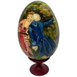 Ceramic egg oil painting depicting gallant scene. H Cm 33