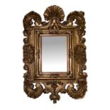 Mirror, nineteenth century. In gilded wooden frame and sculpted. Cm 118x100.