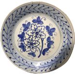 Majolica plate of Caltagirone, Sicily. XX century. In blue. Diameter 37 cm.