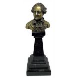 Bust of eighteenth-century character, the nineteenth century, man on marble base truncated pyramid.