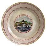 Large wall Caltagirone plate, Sicily late nineteenth, early twentieth century. Depicting homes.