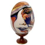 Ceramic Egg, hand painted with floral decorations. H Cm 33 with base