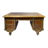 Writing desk in walnut, nineteenth century. Central drawer and three Drawer on each side, foot