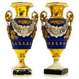 Beautiful pair of Empire porcelain vases. Old France. Early nineteenth century. H 31 cm.