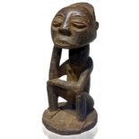 Wooden figurine of "wise" manjima. Tanzania, the twentieth century, 17 x 7.5 cm.