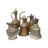 Group of 5 Pitchers in brass, Tunisia. Cm 47,37,36,33, 25.