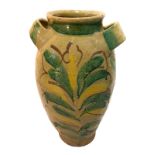 Two-handled vase in Burgio tiled, late nineteenth century. Decorated in green and yellow leaves. H