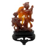 Chinese statuette in brown carnelian depicting "Motherhood" (Guanine with daughter). H 11. H cm