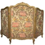 Wooden screen with three doors, the late nineteenth century. Upholstery floral. H cm 120x166.
