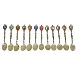 twelve 12 silver little spoons with enamels depicting the emblems of Italians cities. H cm 11,5.