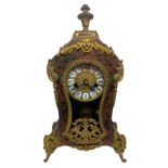Boulle style clock, XX century. H cm 36, untested