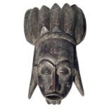 African mask. XX century ebonized wood. Cm 44x26.