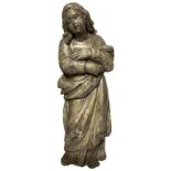 Wooden statue depicting a young St. Agatha, the seventeenth century, worked with silver leaf. H cm
