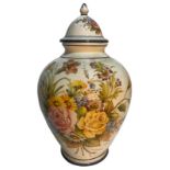 Potiche in Bassano majolica. White background decorated with flowers. H 50 cm