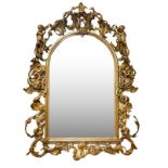 Mirror, nineteenth century, with gilded wooden frame and elegant decorations Ramage and Putti. H cm