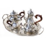 Silver set consisting of tray, coffee pot, teapot, milk jug and sugar bowl bowl, XX century. Tray