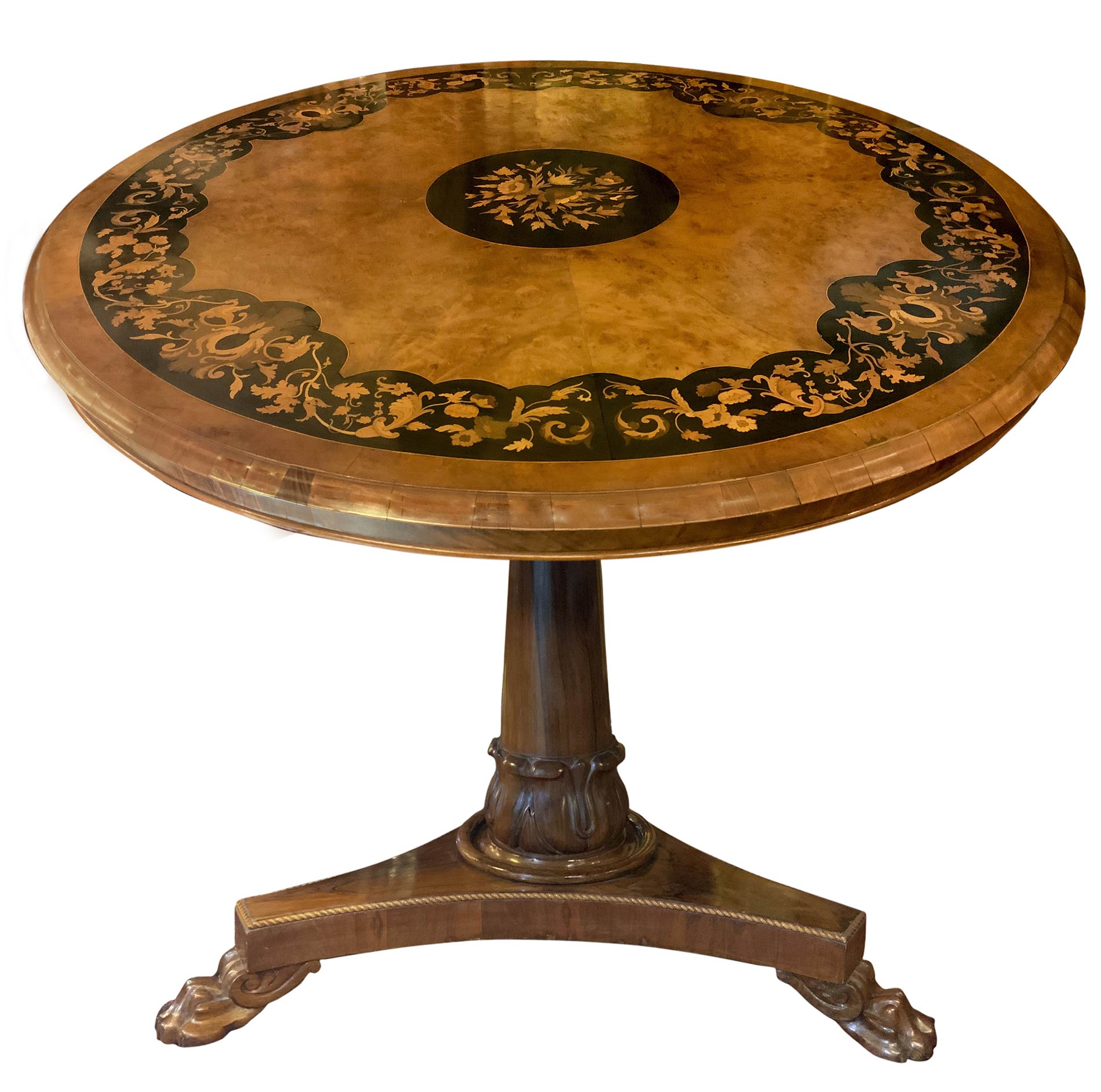Round table inlaid on the floor with light woods. H 75 cm diameter cm 132. Central Foot lion.