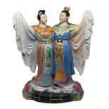 Chinese statue in white-body with polychrome decoration depicting two lovers dressed in traditional