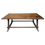 Refectory table in walnut, with four legs torchon with horizontal strings on both sides. End of the