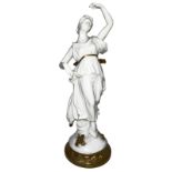 Statue porcelain, lady posing. H Cm 18. Dated 1942.