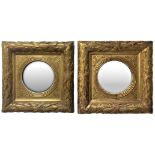 Pair of gilded wooden frames with convex mercury mirror, early 19th century. Cm 40x40. Mirror