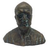 Cast bronze depicting Mussolini bust, twentieth century, gold patina, H cm 9 ,base, cm 10.