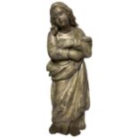 Wooden statue depicting a young St. Agatha, seventeenth century, worked with silver leaf. H cm 59.