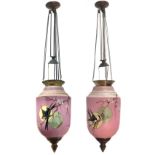 Couple of pendant lamps in pink opaline decorated with flowers and birds, the early twentieth