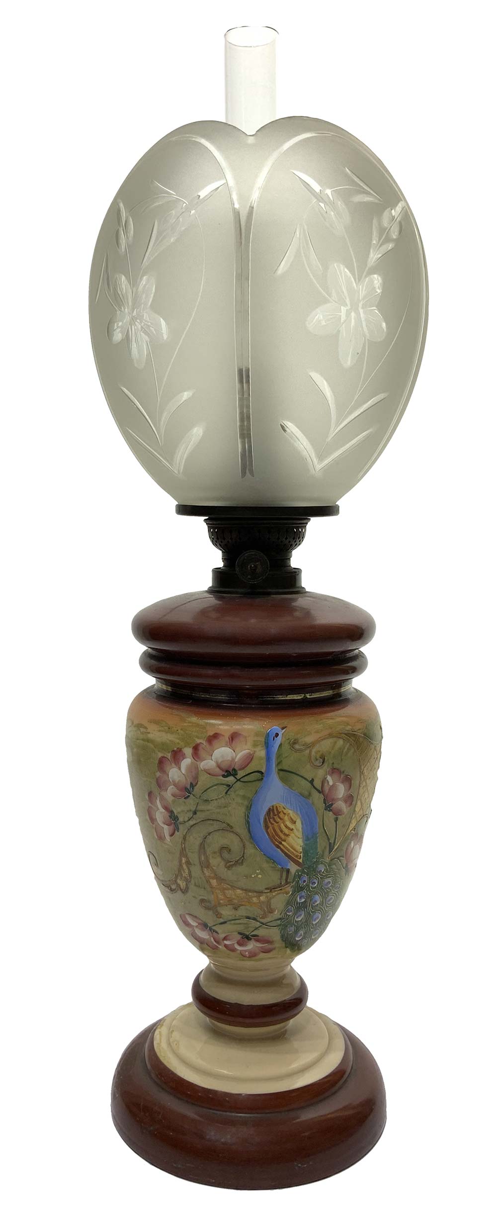 Oil lamp with peacocks decorations and floral carvings glass cup, XX century. H 56 cm.