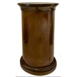 Column bedside, nineteenth century. With circular base, central door and undermount drawer. In