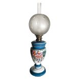 Lamp in blue opaline with floral decorations . Late nineteenth century. H 57 cm
