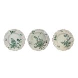 3 wall plates in Cerreto majolica, eighteenth century. Decor in green monochrome and scalloped