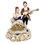 Capodimonte porcelain statue depicting couple with guitar. H cm 14. Small missing pieces.