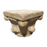 Gray-white granitic stone capital, XI-XII century. H cm 33, base cm40x40.