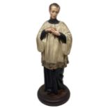 Papier-m&acirc;ch&eacute; sculpture depicting Saint Aloysius de Gonzaga wearing a white robes, late