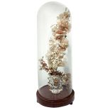 Glass case with wooden base, inside porcelain vase Louis Philippe with fabric floral composition.