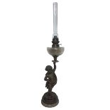 Oil lume depicting Cupid with quiver and arrows. Antimony with marble base. H cm 52, h cm 76, with