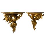 Two golden wooden wall shelves, early 20th century. H cm 25. H cm 27.