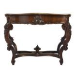 Rosewood console in the Louis Philippe style, early twentieth century Sicily. With wooden carved