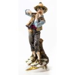 Capodimonte porcelain statuette, Naples, XX Century. Flute Player. H Cm 22. Small missing pieces.