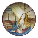 Majolica plate depicting St. Agatha in prison, hand painted. Diameter 26 cm Signed and dated on the