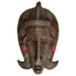 African mask with copper applications and tissue. Cm 34x18,5.