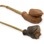 Pair of pipes. "sleeping farmer." Catania, Sicily. Early 1900s. Pipa with cooker and torch clay,