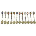 12 teaspoons in 800 silver, with enamels depicting arms of Italian cities. H 11.5 cm