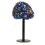 Sculpture-shaped hat, elegantly decorated with colorful materials and various resins, Laura