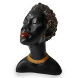 Half bust in black patinated plaster depicting abissinia, Austrian production. Wear and tear,