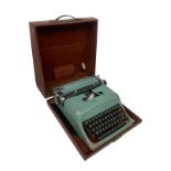 Olivetti "Letter 44" typewriter with original case. 60's